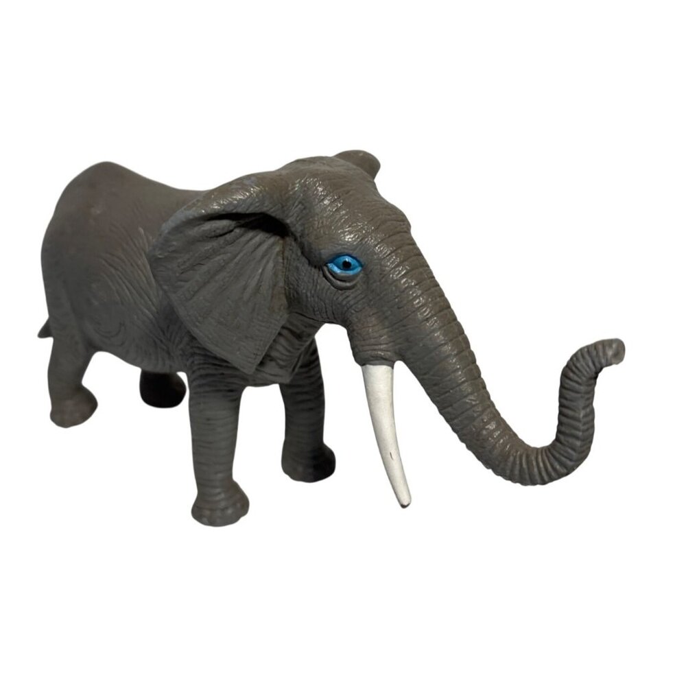 Realistic Gray Plastic Elephant Figurine 1980's Blue Eyes 7" x 4.5"